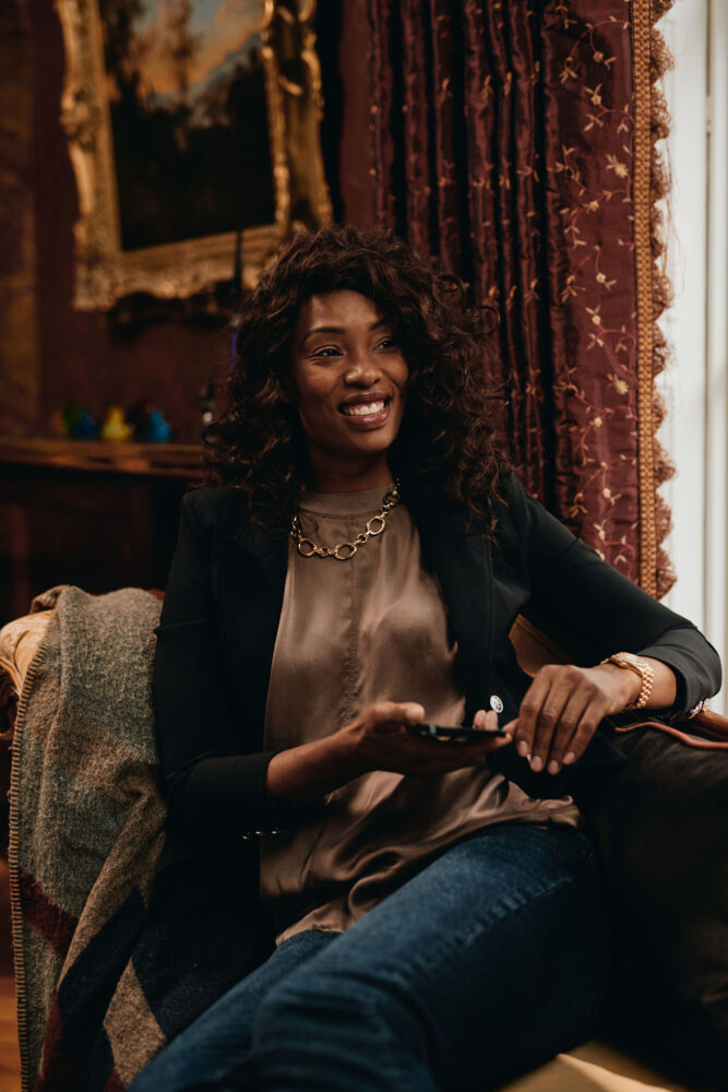 Woman using The Other House App